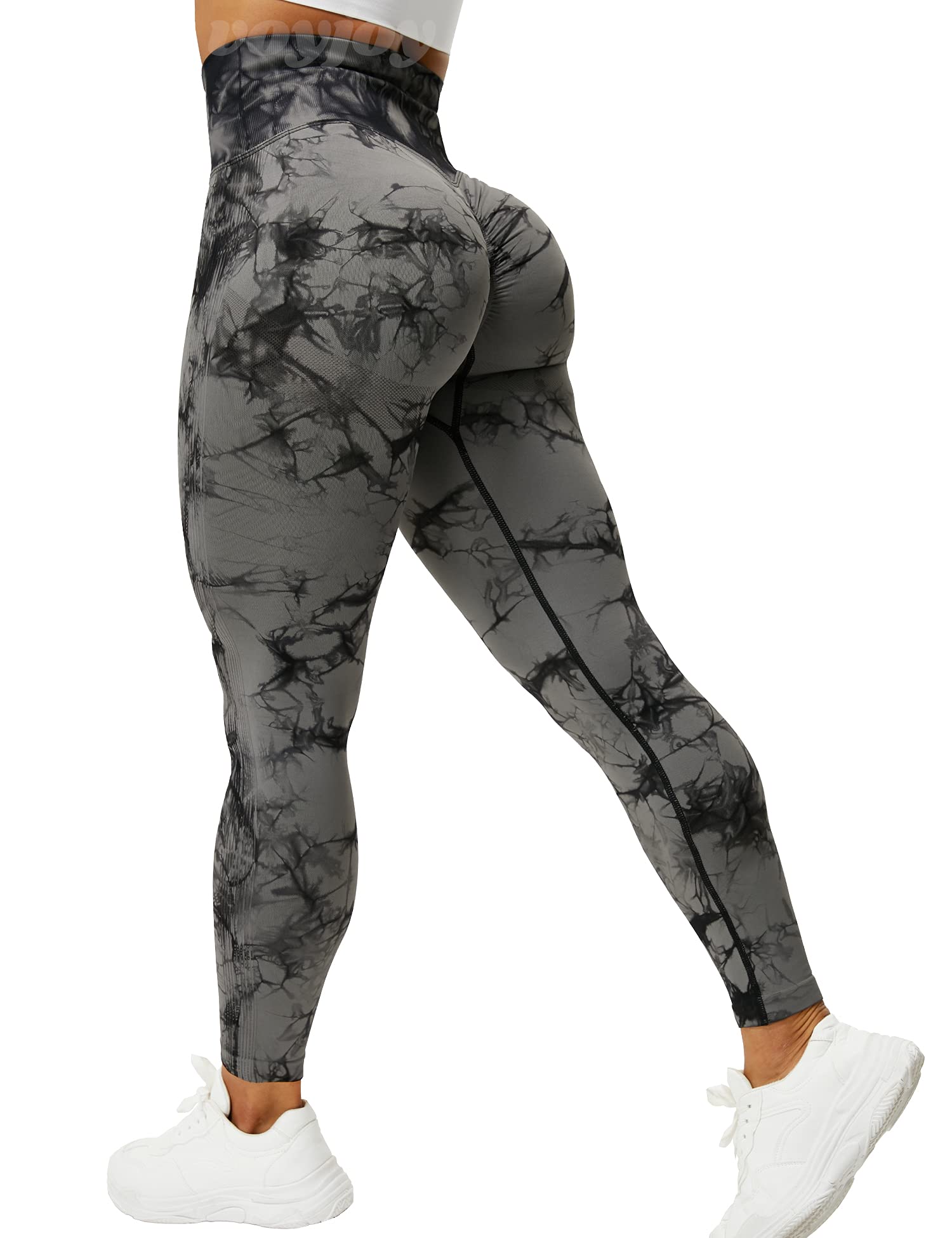one young woman wearing grey camoflage Yogapants at the gym, blonde  pigtails, curly hair, doing yoga, backwards - SeaArt AI