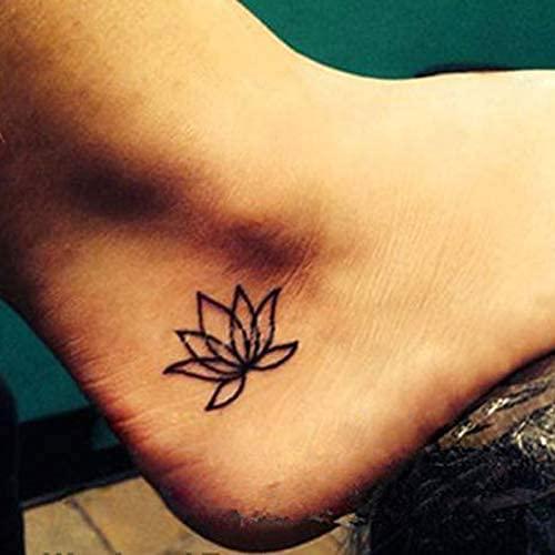 small lotus flower foot tattoos