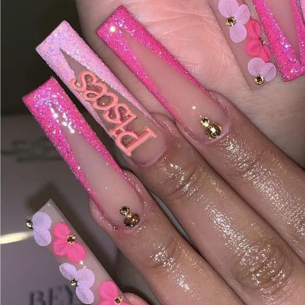 Pretty in pink: Valentine's Day nail art with Zodiac rhinestones.