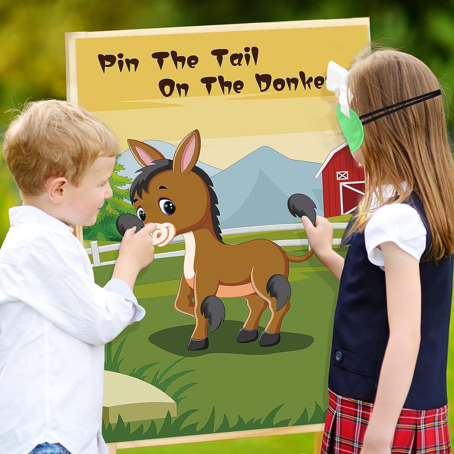 kids playing pin the tail on the donkey