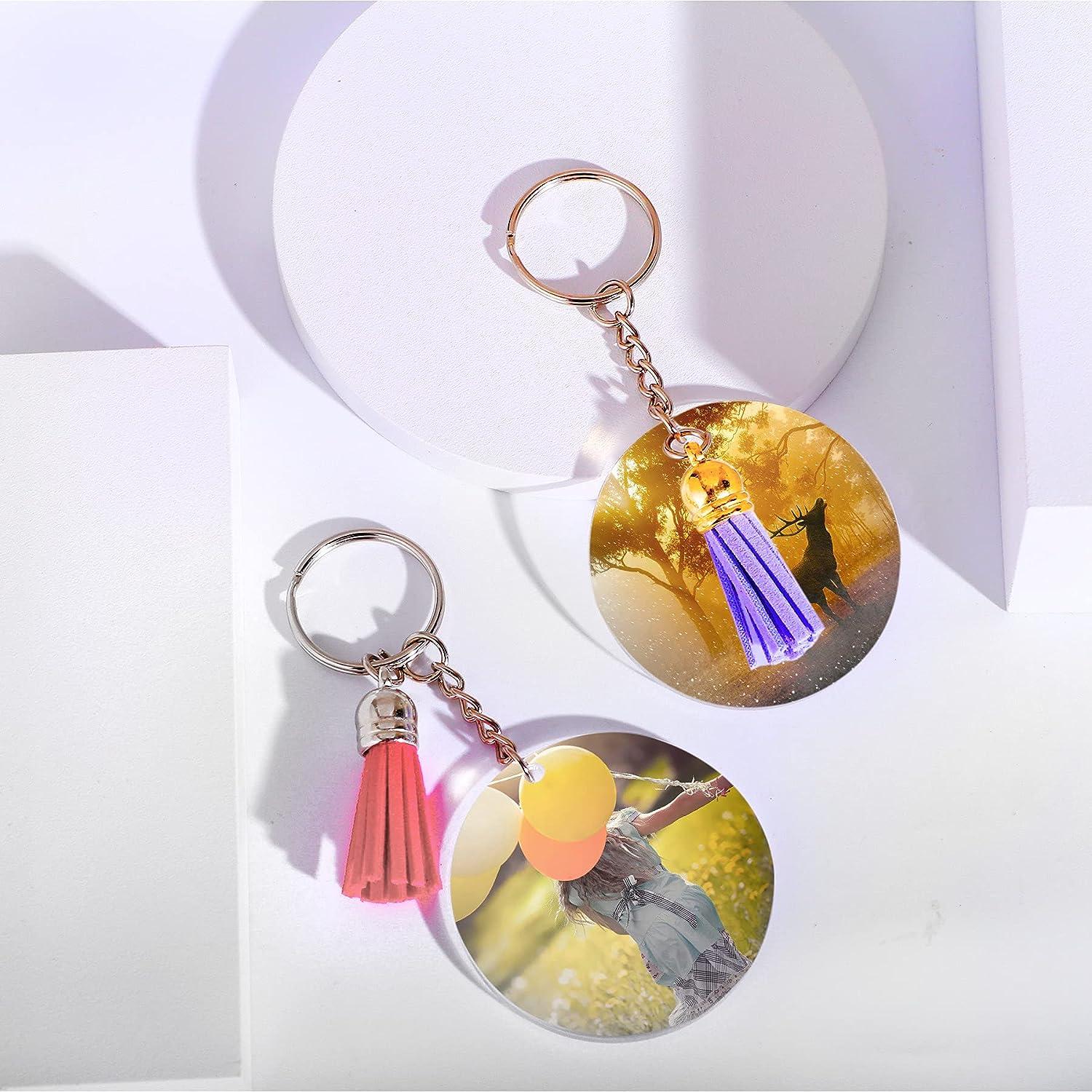 Set of blank round golden and silver keychains is hanging on the