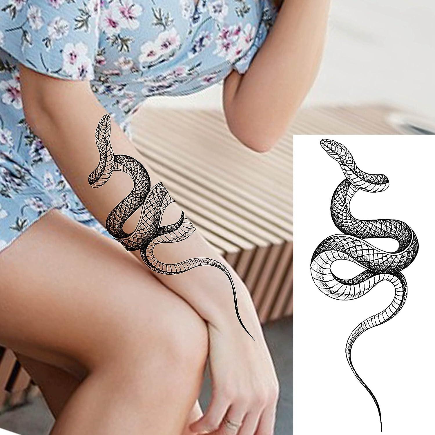Snake tattoo,from shoulder or half top arm, going to the collarbone on  Craiyon