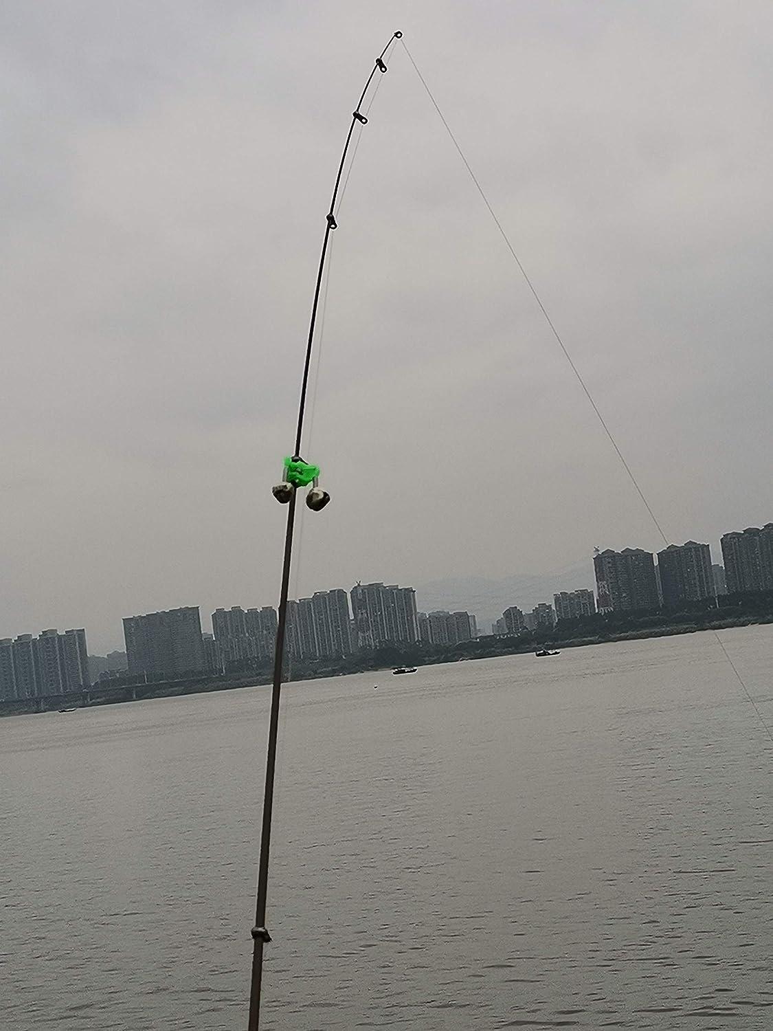 Silver Fishing Bells Are Worn On A Fishing Rod While Fishing