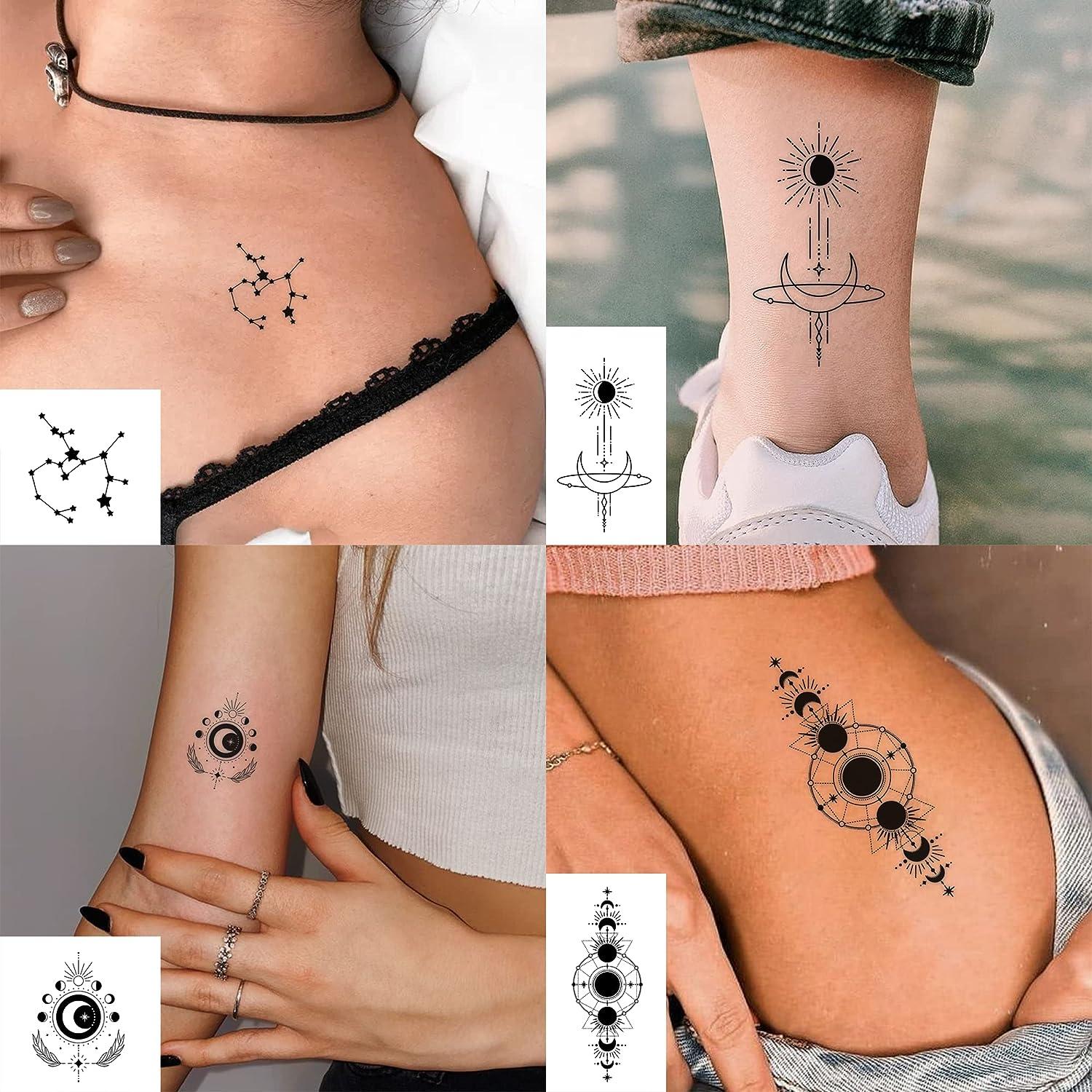Gemini constellation tattoo located on the pelvis.