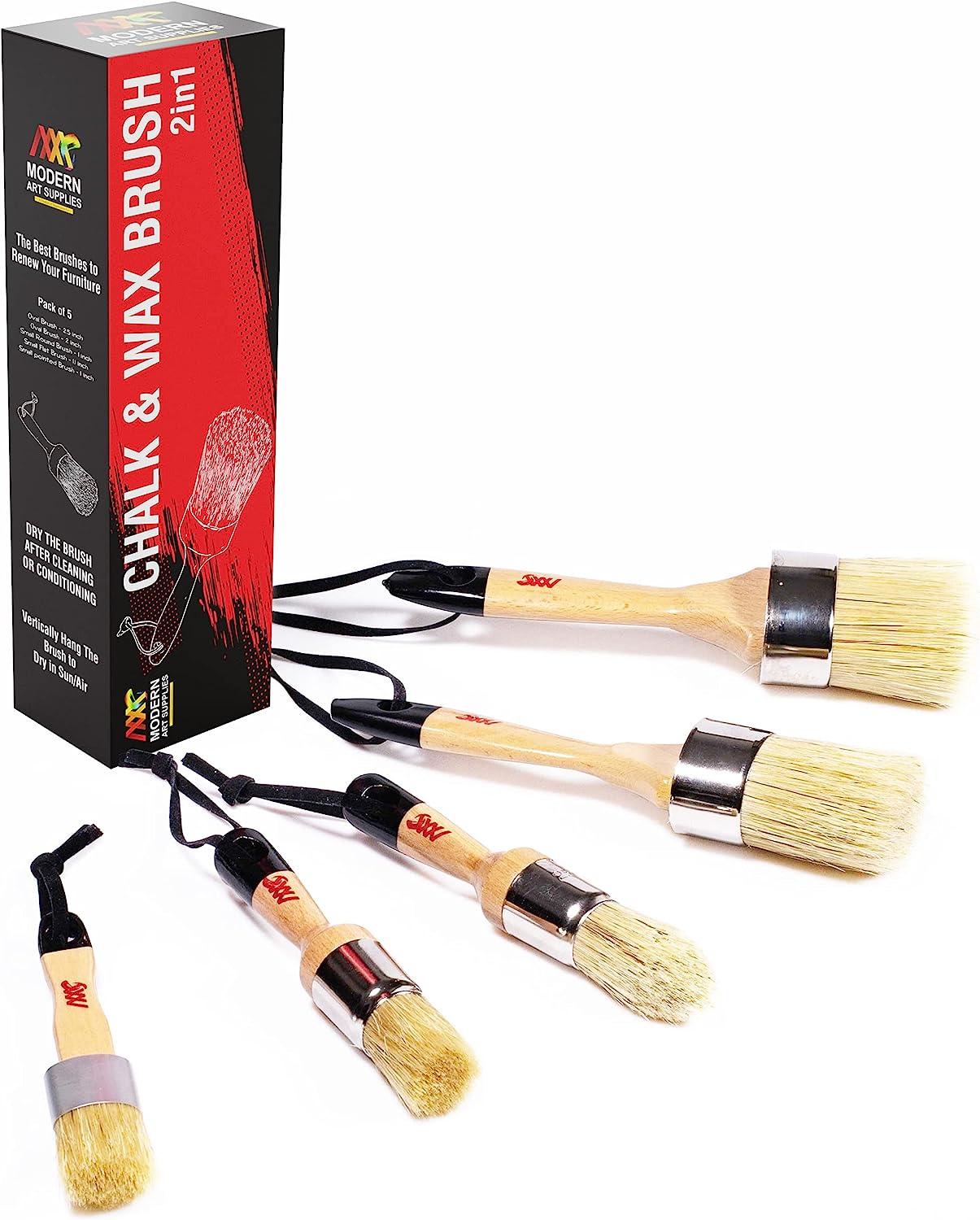 Large Selection Of Paint Brushes And A Mini Paint Palette by
